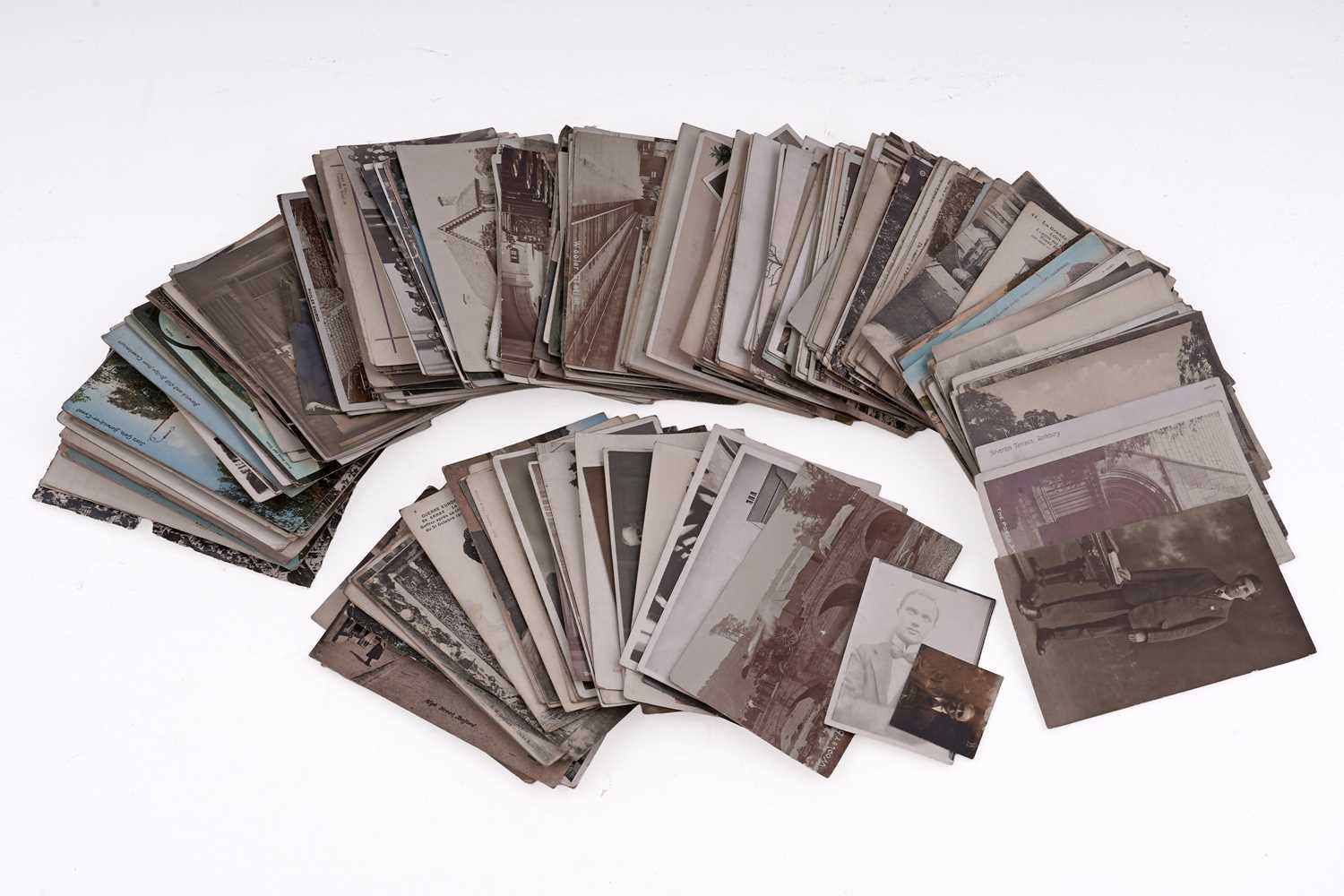 Lot 102 - A collection of loose postcards