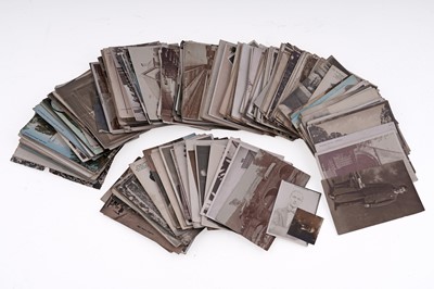 Lot 102 - A collection of loose postcards