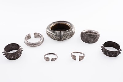 Lot 207 - Omani silver metal amulet bangles; and an anklet