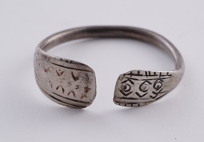 Lot 207 - Omani silver metal amulet bangles; and an anklet