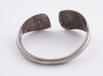 Lot 207 - Omani silver metal amulet bangles; and an anklet