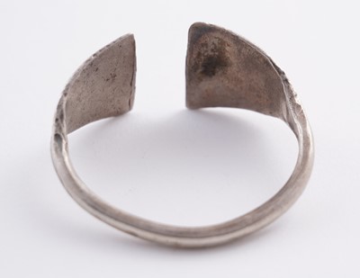 Lot 207 - Omani silver metal amulet bangles; and an anklet