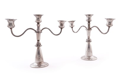 Lot 4 - A pair of Elizabeth II silver three-light candelabra