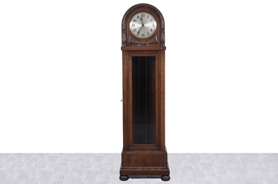 Lot 117 - An early 20th Century carved oak 30-hour longcase clock