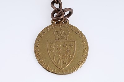 Lot 312 - A 9ct rose gold double "Albert" curb-link watch chain with a fob George III 1787 gold guinea