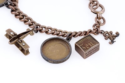 Lot 313 - A 9ct rose gold charm bracelet, with fob George III 1794 gold guinea, and sovereigns