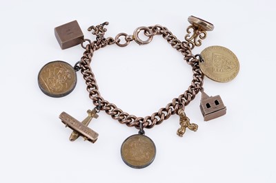 Lot 313 - A 9ct rose gold charm bracelet, with fob George III 1794 gold guinea, and sovereigns