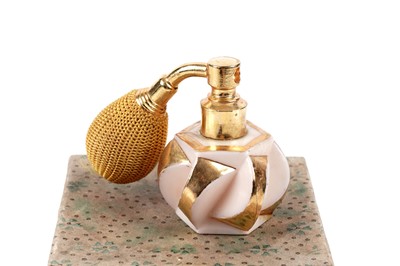 Lot 214 - A 1950's Stratton for Coty novelty lipstick compact; and a 1950's perfume atomiser