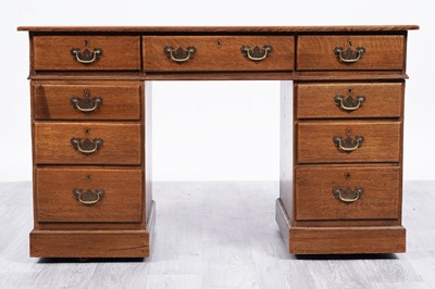 Lot 1 - An early 20th Century oak pedestal desk