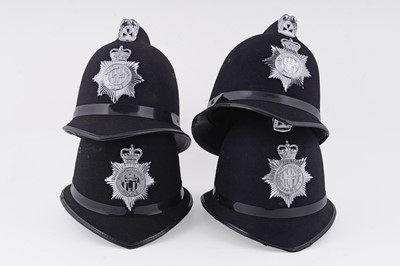 Lot 150 - A collection of four Northumbria Police helmets
