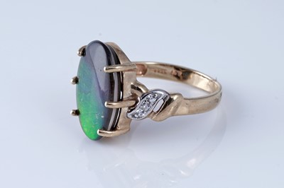 Lot 211 - An ammolite and diamond ring