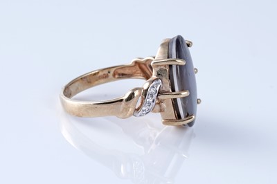 Lot 211 - An ammolite and diamond ring