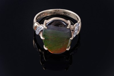 Lot 211 - An ammolite and diamond ring