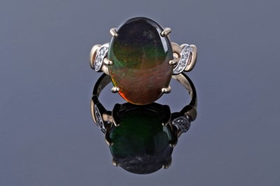 Lot 211 - An ammolite and diamond ring