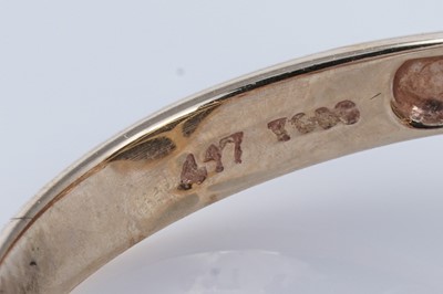 Lot 211 - An ammolite and diamond ring