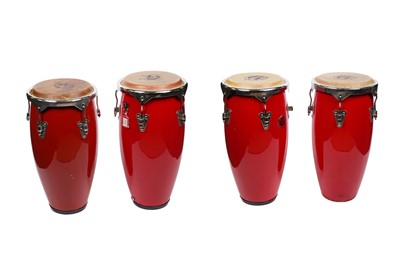Lot 410 - Four Drum Beat conga drums; and harnesses