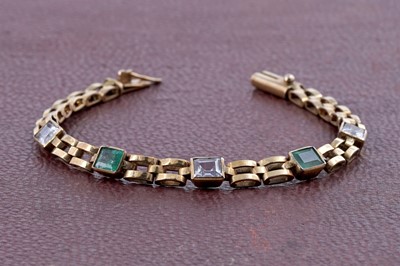 Lot 239 - An emerald and white topaz bracelet