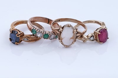 Lot 242 - Four gem set rings