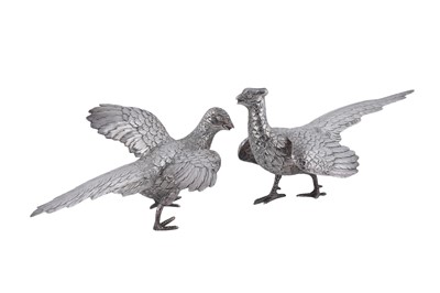 Lot 7 - A pair of continental silver table decorations in the form of a hen and a cock pheasant