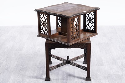 Lot 27 - An ornate Chinese Chippendale style revolving bookcase