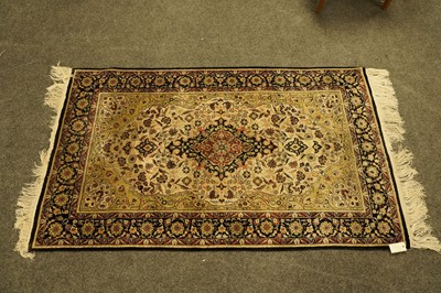 Lot 165 - A silk Tabriz rug