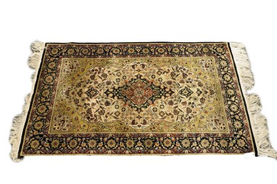 Lot 165 - A silk Tabriz rug
