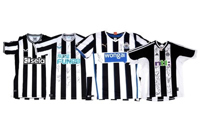 Lot 323 - Three signed Newcastle United Football Club strip; and an unsigned Tonalli shirt