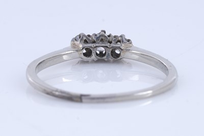 Lot 68 - A three stone diamond ring