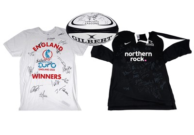 Lot 327 - A Newcastle Falcons autographed shirt and rugby ball; a signed England women’s football T-Shirt
