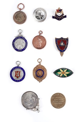Lot 37 - A collection of silver, gold and silver plated medals, fobs and badges