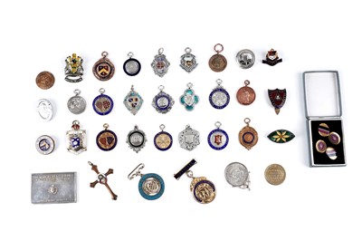 Lot 37 - A collection of silver, gold and silver plated medals, fobs and badges