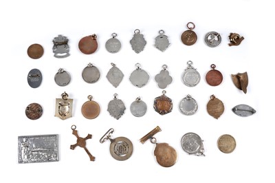 Lot 37 - A collection of silver, gold and silver plated medals, fobs and badges
