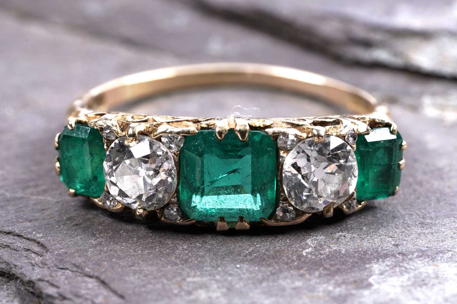 Lot 893 - A Colombian emerald and diamond ring