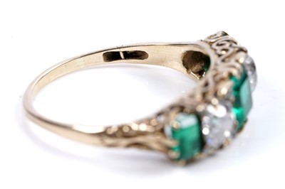 Lot 893 - A Colombian emerald and diamond ring