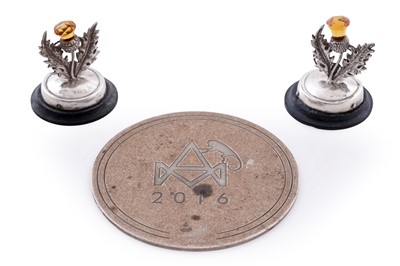 Lot 101 - Two similar George V silver menu card; and a Scottish silver drinks mat