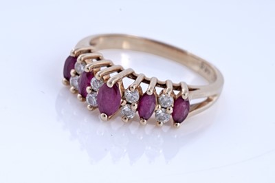 Lot 74 - A modern ruby and diamond ring