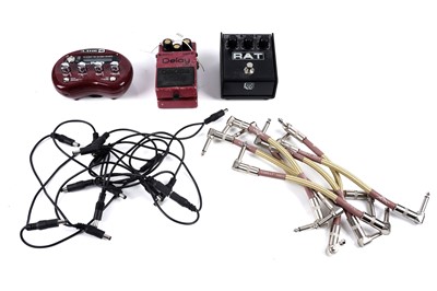 Lot 302 - Three guitar pedals; and connection leads