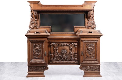 Lot 37 - Chapman & Co, Newcastle: an early 20th Century carved oak mirror back sideboard