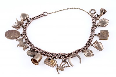 Lot 38 - A 9ct rose gold charm bracelet