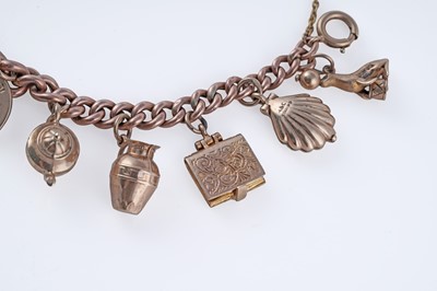 Lot 38 - A 9ct rose gold charm bracelet