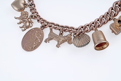 Lot 38 - A 9ct rose gold charm bracelet