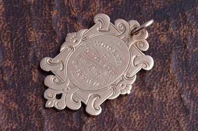 Lot 32 - A Victorian 9ct rose gold Wooler Pigeon Club Annual Meeting 8th Feb 1877