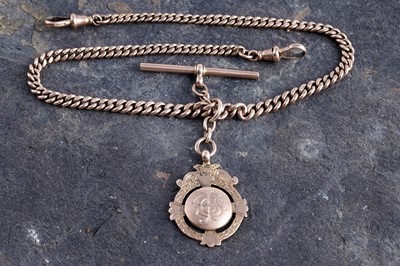 Lot 50 - A 1920's 9ct rose gold double "Albert" watch chain and fob medallion