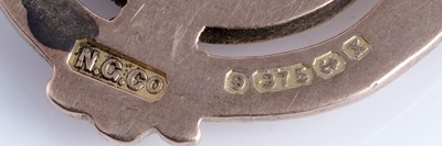 Lot 50 - A 1920's 9ct rose gold double "Albert" watch chain and fob medallion