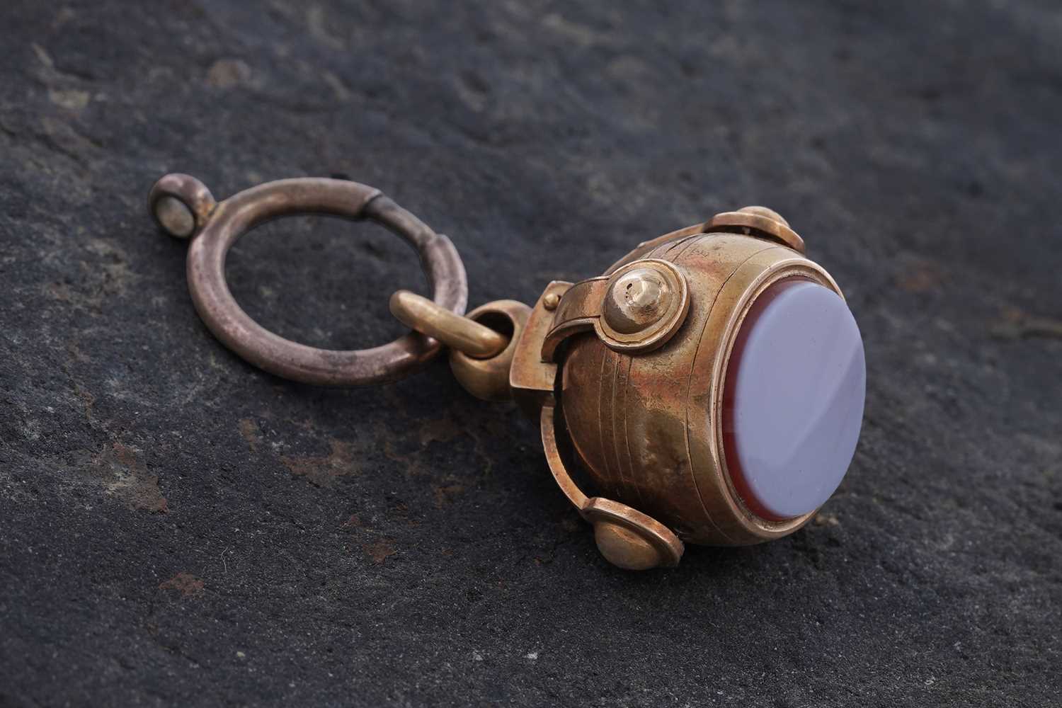 Lot 59 - A Victorian Masonic transforming fob seal in the form of an orb