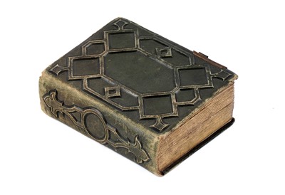 Lot 104 - A Victorian embossed leather photo album