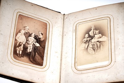 Lot 104 - A Victorian embossed leather photo album