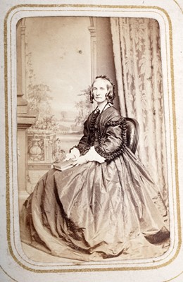 Lot 104 - A Victorian embossed leather photo album