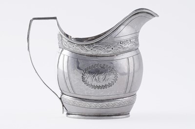Lot 66 - A George III silver cream jug