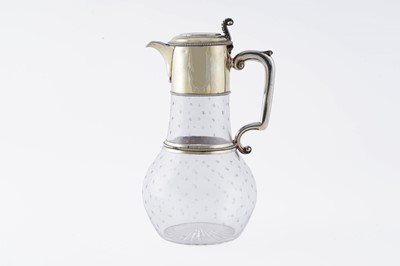 Lot 70 - A Victorian silver gilt mounted clear glass claret jug